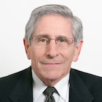 Headshot of Matthew L. Myers, a man with a light complexion and parted gray hair wearing eyeglasses and a dark suit and tie