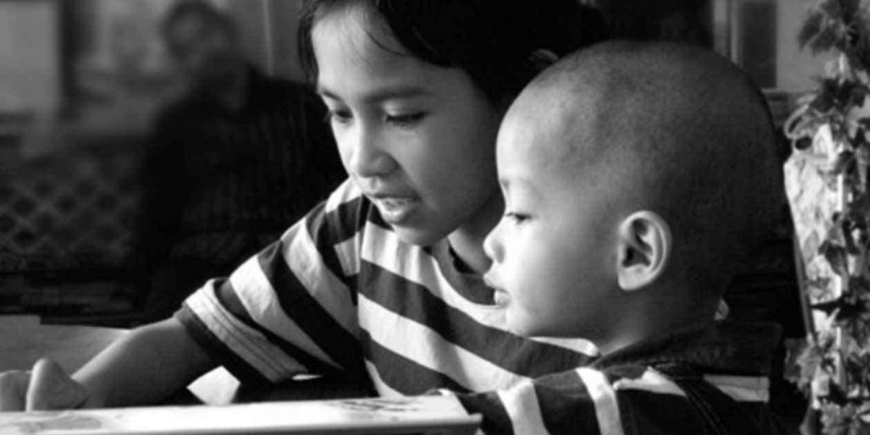 Two Children reading