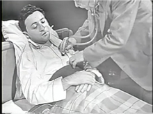 Actor demonstrates the symptoms of Asian flu. (Johns Hopkins File 7)