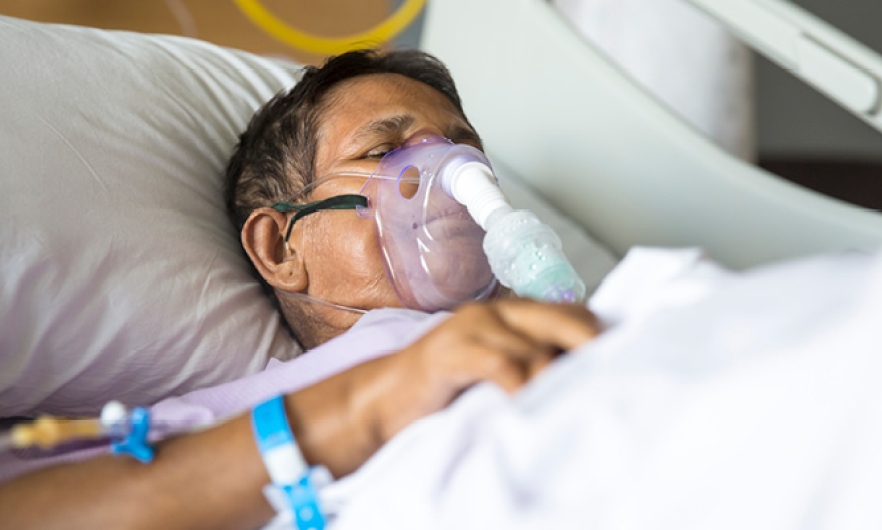 Patient using a ventilator