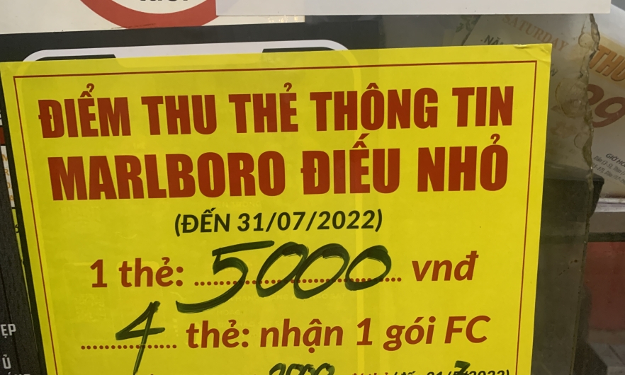 Sign showing price of cigarettes in Vietnam store