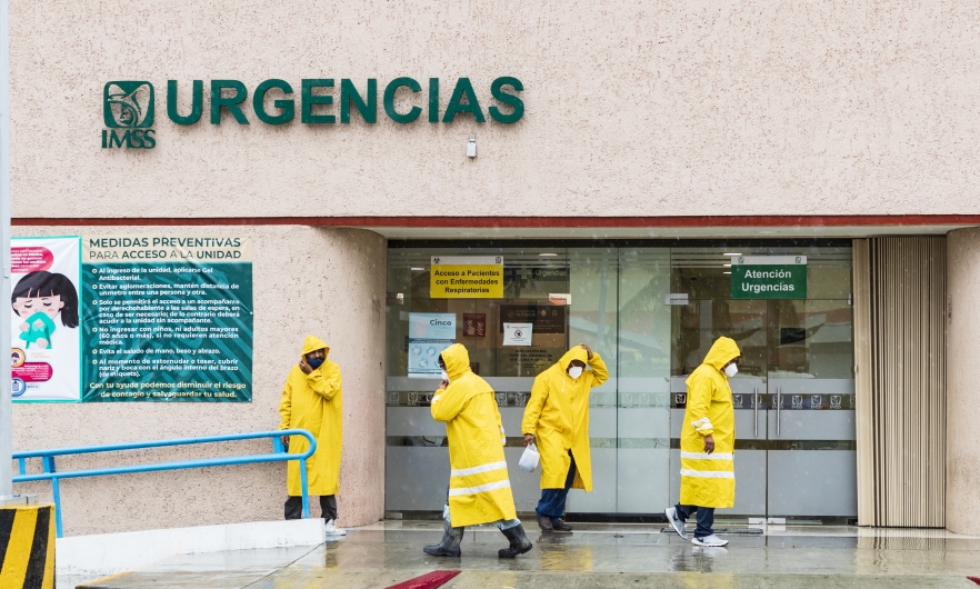 Maintenance employees of the IMSS hospital in Cabo San Lucas, Mexico, prep for Hurricane Genevieve on August 19, 2020. 