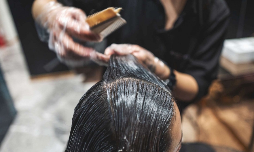 woman receiving service in a hair salon