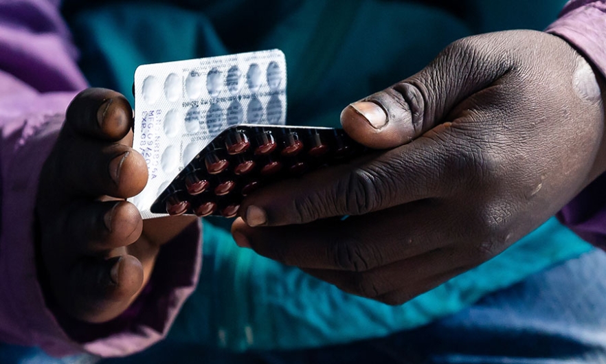 A patient holds a packet of tablets received as part of his treatment at Rutsanana Polyclinic in Glen Norah township, Harare, Zimbabwe, June 24, 2019.  Image: Jekesai Njikizana/AFP/Getty 