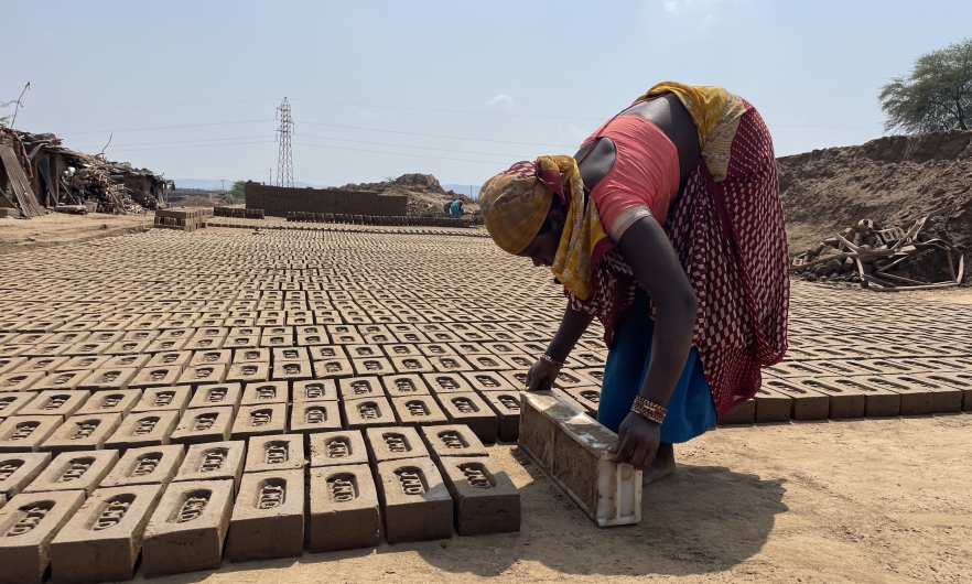 A woman molds bricks for a kiln in Rajasthan’s Ajmer district.