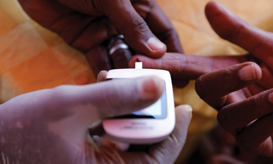 A doctor gives a free blood sugar test on World Diabetes Day in Khartoum, Sudan on Nov. 14, 2019. Mohamed Khidir/Xinhua via Getty
