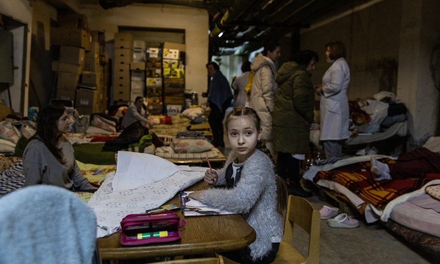 A Ukrainian girl draws in a bomb shelter at the Okhmadet Children&#039;s Hospital on March 01, 2022 in Kyiv. Chris McGrath/Getty Images