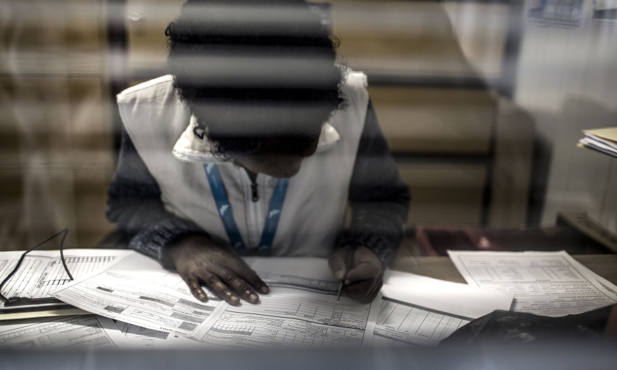 A peer educator of the Wits Reproductive Health Institute Sex Worker Programme sits in consultation with a client at the clinic in Hilbrow, Johannesburg, on July 20, 2017.