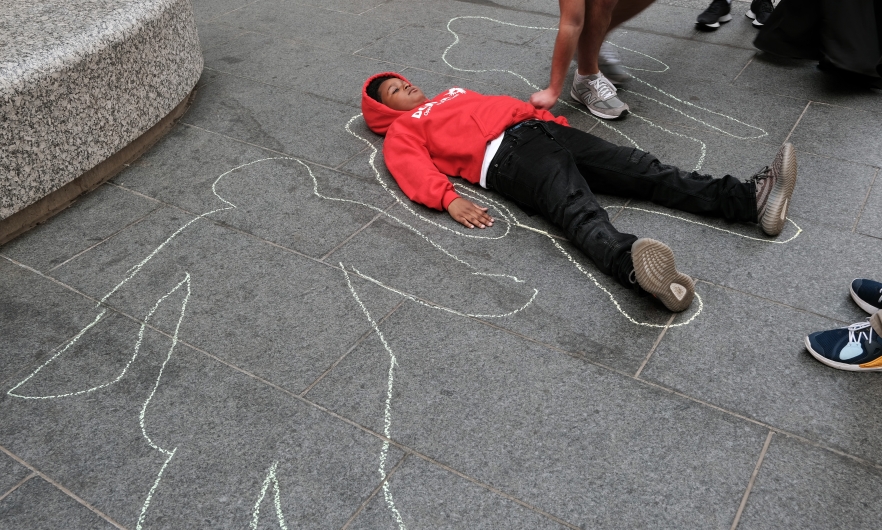 Local teenagers participate in a &quot;Die In&quot; to draw attention to gun violence in Philadelphia, Pennsylvania. April 14. Spencer Platt/Getty