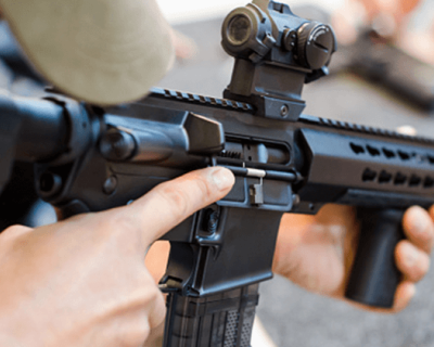 Close-up picture of a rifle in hand