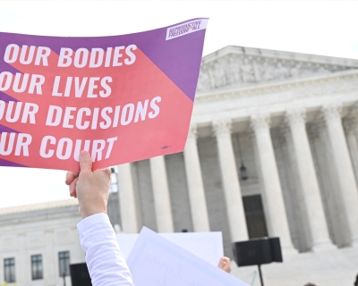 Pro-abortion activists rally for "reproductive rights and emergency abortion care" outside the U.S. Supreme Court in Washington, D.C., on April 24, 2024. Saul Loeb/AFP via Getty Images