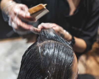 woman receiving service in a hair salon