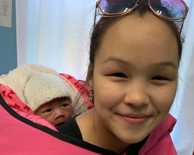 A mother and her newborn who was delivered at the Inukjuak Maternity amidst rising COVID-19 restriction in Nunavik, Quebec, September 2020. Image by Patrice Latka.
