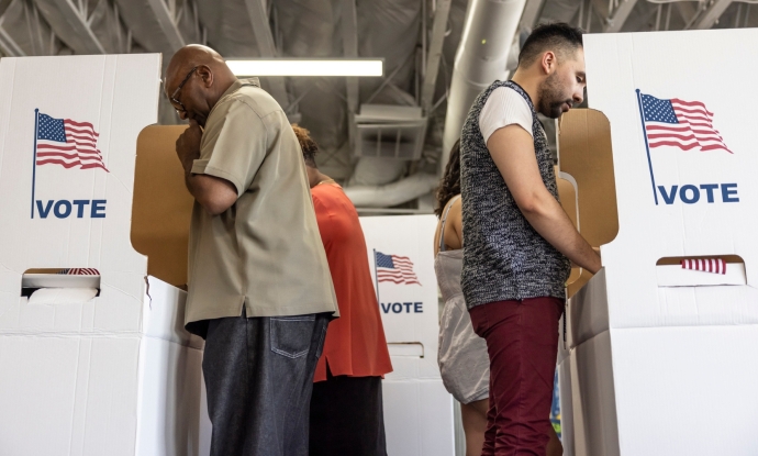 people vote at polling place