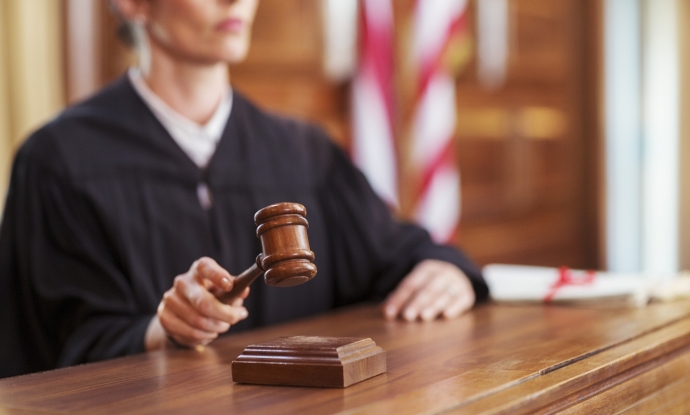 image of female judge with gavel