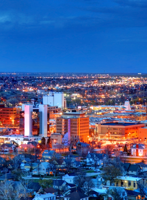 Baltimore at night with lit-up buildings 