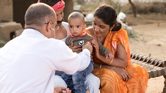 doctor checking a child's health