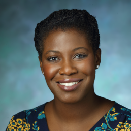 Dr. Chidinma Ibe smiles for a professional photo.