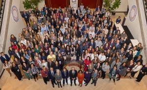 Group photo from above of Bloomberg American Health Initiative fellows and leadership at 2024 summit