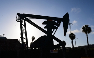 An oil pumpjack is viewed in Signal Hill, south of Los Angeles, California, on April 21, 2020.