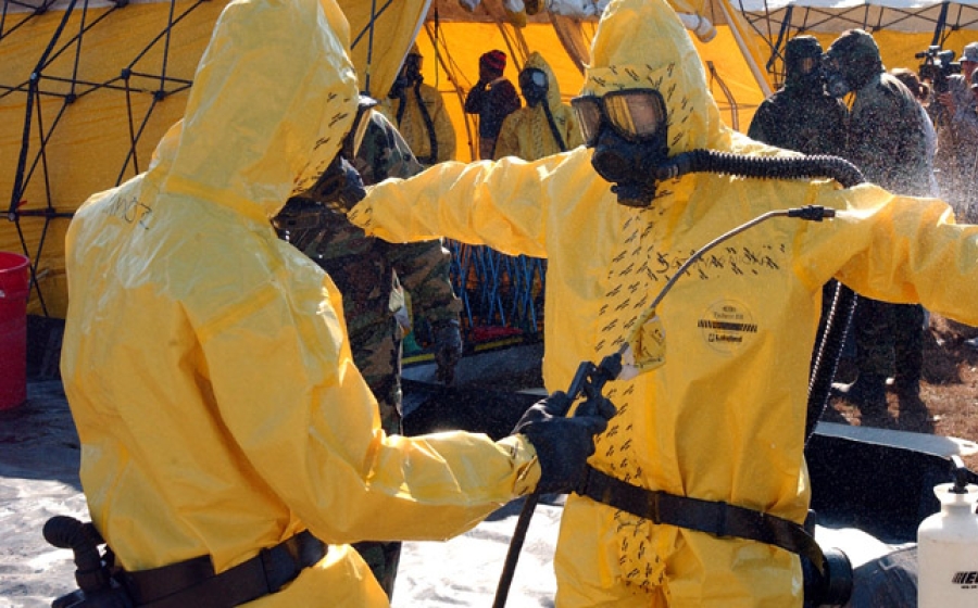 From Lab Coats to Hazmat Suits: IAEA Trains Scientists to Work Safely With  Ebola