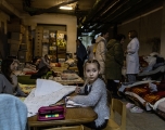 A Ukrainian girl draws in a bomb shelter at the Okhmadet Children's Hospital on March 1, 2022 in Kyiv. Chris McGrath/Getty Images