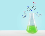 illustration of a flask with green liquid on a table with a blue background with multicolored bubbles coming out of it