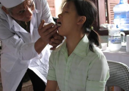 Child getting Cholera vaccine in Vietnam
