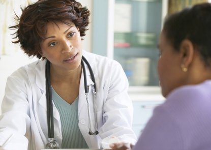 image of female doctor talking to patient